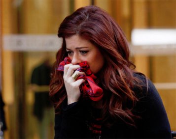 Stil image from "A Farewell to Scarves"Image source:http://ca.omg.yahoo.com/blogs/omg-tv/smash-overhaul-continues-rid-scarves-182623707.html