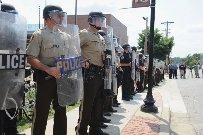 Police presence in Ferguson on August 11th 2014 image source: PBS news hour